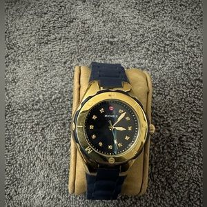 Michele watch Jelly Collection the band is Navy with gold, needs a battery.